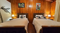 Habitación Coqueta – cómoda habitación doble en Buglas Birding Lodge, hostería amazónica en Limón Indanza
